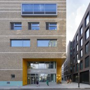 The community entrance to Marlborough Primary School engages apartment, architecture, building, commercial building, condominium, corporate headquarters, elevation, facade, house, metropolitan area, mixed use, neighbourhood, real estate, residential area, window, gray