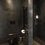 ​​​​​​​Given the through nature of this bathroom, it architecture, bathroom, floor, flooring, tiles, plumbing fixture, shower, black, Celia Visser Design