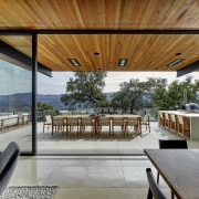 Views across the valley predominate in the living architecture, deck, design, floor, tiles, furniture, home, house, interior design, living room, patio, porch, shade, table, window, wood, tiles,  floor, de Vito Design + construction