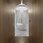 A sculptural slipper bath and ornate chandelier make architecture, bathroom, flooring, interior design, plumbing fixture, tile, wood, wood flooring, chandalier, Sandra Diaz-Velasco, bath