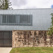 ​​​​​​​A sandstone wall is the only remaining element residential area, tree, wall, white, CplusC Architectural Workshop