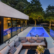 For this project by Freeman Ball Developments, tilt-panel architecture, backyard, building, courtyard, design, estate, home, house, interior design, landscaping, leisure, lighting, patio, property, real estate, reflecting pool, residential area, roof, room, swimming pool, tree, villa, gray, black