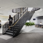 An ornate stair between the VicRoads’ mid-level office architecture, black-and-white, building, design, ornate handrail, interior design, lobby, stairs, VicRoads, offices