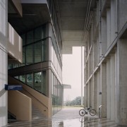 The ground-floor entry to the SDE4 building is architecture, building, facade, glass, material property, SDE4 building, raw materials, natural steel, metal, concrete, SDE4 building