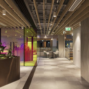 Light-catching dichroic film features on the on the Mercury, Warren and Mahoney,  architecture, building, design, floor, lighting, lobby, black, brown