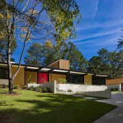 ​​​​​​​Following renovation, the original 1950s home building is brown