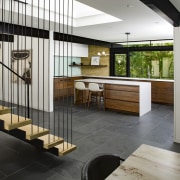 ​​​​​​​The original kitchen in this 1950s home was gray, black