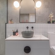 The stone vanity top and soft grey basin 