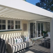 Outdoor Room creates more space for large, extended architecture, awning, building, deck, furniture, home, house, outdoor structure, patio, porch, property, real estate, roof, room, shade, siding, gray, black