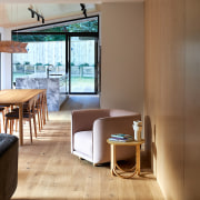 View across living spaces to the outdoors. - 