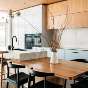 Kitchen detail showing off feature ceiling. 