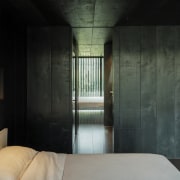 Looking from one bedroom through the shared bathroom 