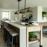 A vintage baker’s table and breakfast bar both 