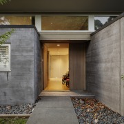 A tapered forced perspective view between concrete boxes architecture, building, concrete, door, estate, facade, cladding, home, house, interior design, property, real estate, residential area, tree, wall, yellow, gray, black