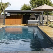 Swimming pool with cabana and outdoor kitchen at 