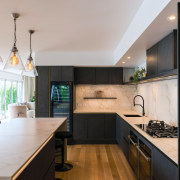 The kitchen boasts an L-shaped perimeter workspace. 