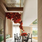 Dining area showing soaring upstairs volume. 