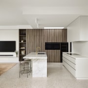 The light tones of the polished concrete floor 