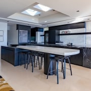 The kitchen offers lots of bench space and 