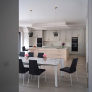 The kitchen with classic cabinet fronts and pale 