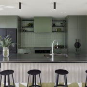 Green is the block colour in the kitchen. 