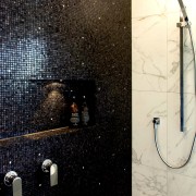 A long  recess complete with with LED lighting architecture, bathroom, plumbing, plumbing fixture, room, shower, tile, wall, black