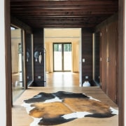 Warm woods on floor, ceiling and walls in 