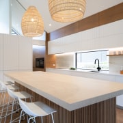 The designer replaced a large, floor-mounted window in 