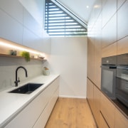 Walk in pantry with ample wall cabinetry on 