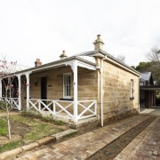 The addition to the sandstone cottage is in 