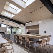 The kitchen is bathed in natural light thanks 