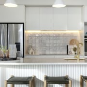 The contemporary kitchen includes a wealth of storage 