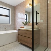 A luxurious ambience recommends the main bathroom, complete 