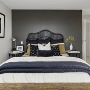 Features of the master suite are a headboard 