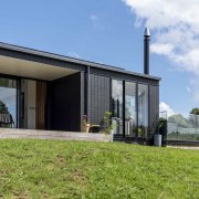 The sheltered north-facing side deck. - Country road 
