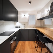 The apartment's compact and efficient operational kitchen. 