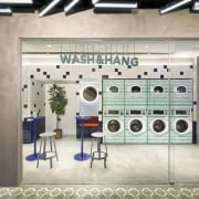 Wash &amp; Hang takes on a more social building, design, eyewear, interior design, room, gray, white