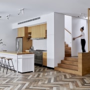 A herringbone floor creates a dramatic feature in 