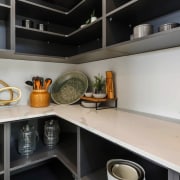 The kitchen's walk-in, user-friendly scullery has a place 