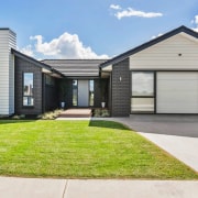 Complementary facade finishes give the home great street 