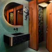 View of the powder rooms and vanity area. 