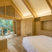 Shishi-iwa guest room, second floor. - Shishi-iwa House, architecture, bed, bedroom, building, ceiling, daylighting, floor, furniture, home, house, interior design, property, real estate, room, window, wood, brown, orange