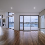 The exposed raw concrete and timber flooring make 