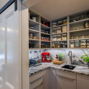 The walk-in pantry was designed to hide all 