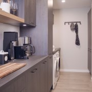 The laundry area runs on from the kitchen. 