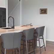 Kitchen, breakfast stools and an appropriate barn house 