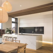 The contemporary kitchens looks one way to the 