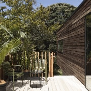 The north facing deck is a few steps brown, black