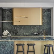 Brushed gold- and marble-look surfaces are always in 