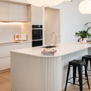 Kitchen detail showing fluted island complete with breakfast 